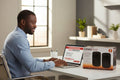 OmniHeat digital ceramic personal heater packaging on a black background