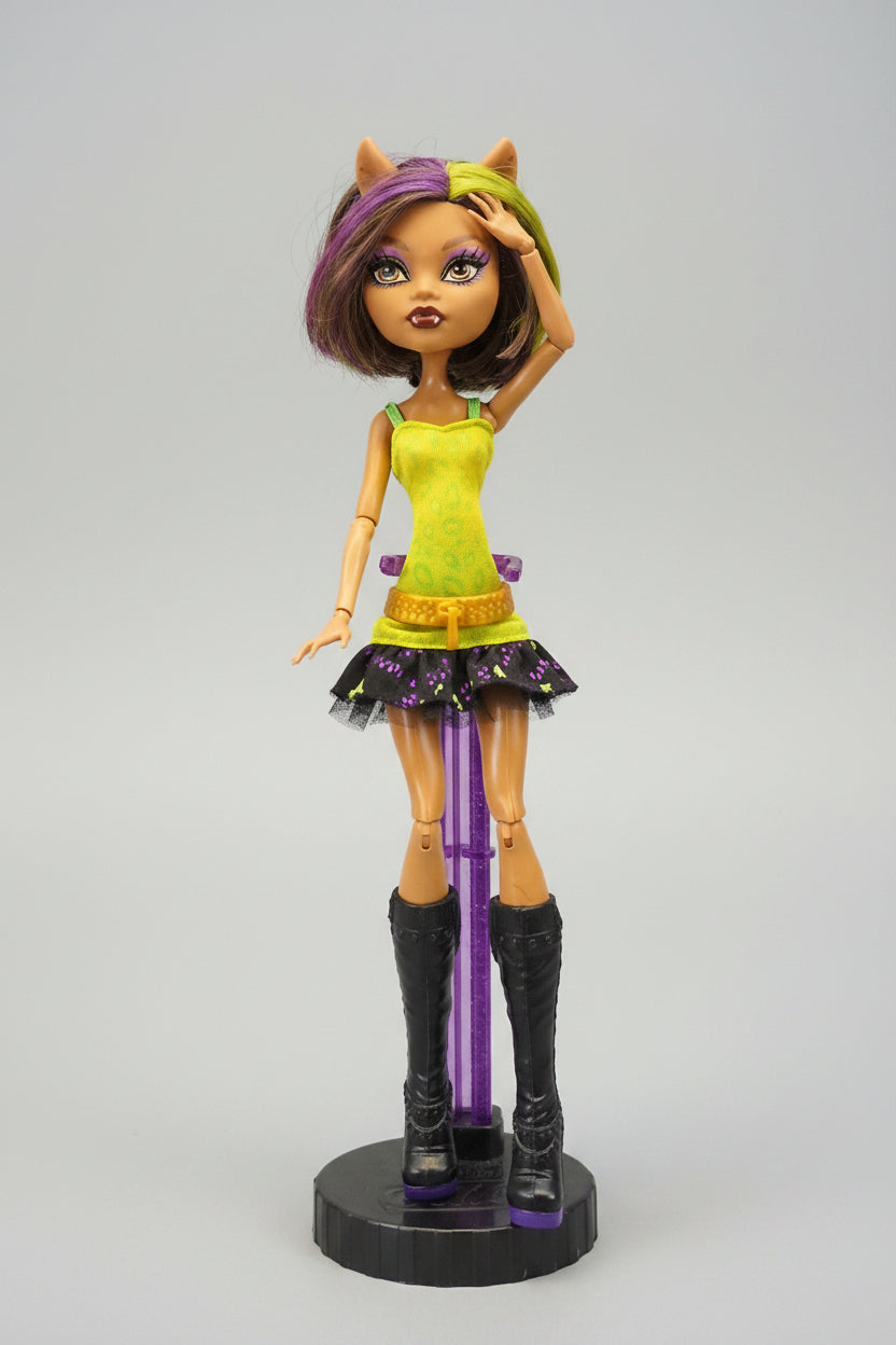 Toy figure with a colorful outfit on a black background