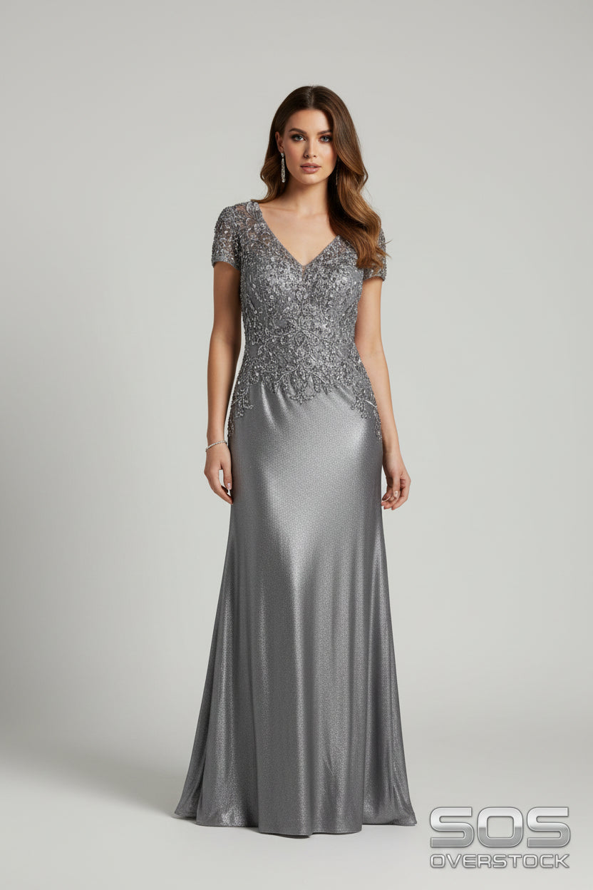 Silver evening gown on a hanger with boxes in the background