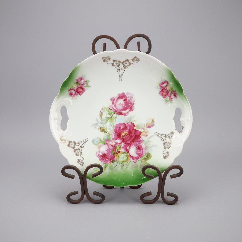Decorative ceramic plate with floral design on a black background