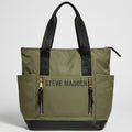 An olive green Steve Madden tote bag with black handles, a black bottom panel, and 'STEVE MADDEN' printed in black across the front pocket, shown on a white background.