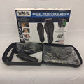 Wahl high performance all-in-one complete haircutting and touch-up kit, shown with its retail box and the opened carrying case containing the black electric clippers and multiple black and silver blades.